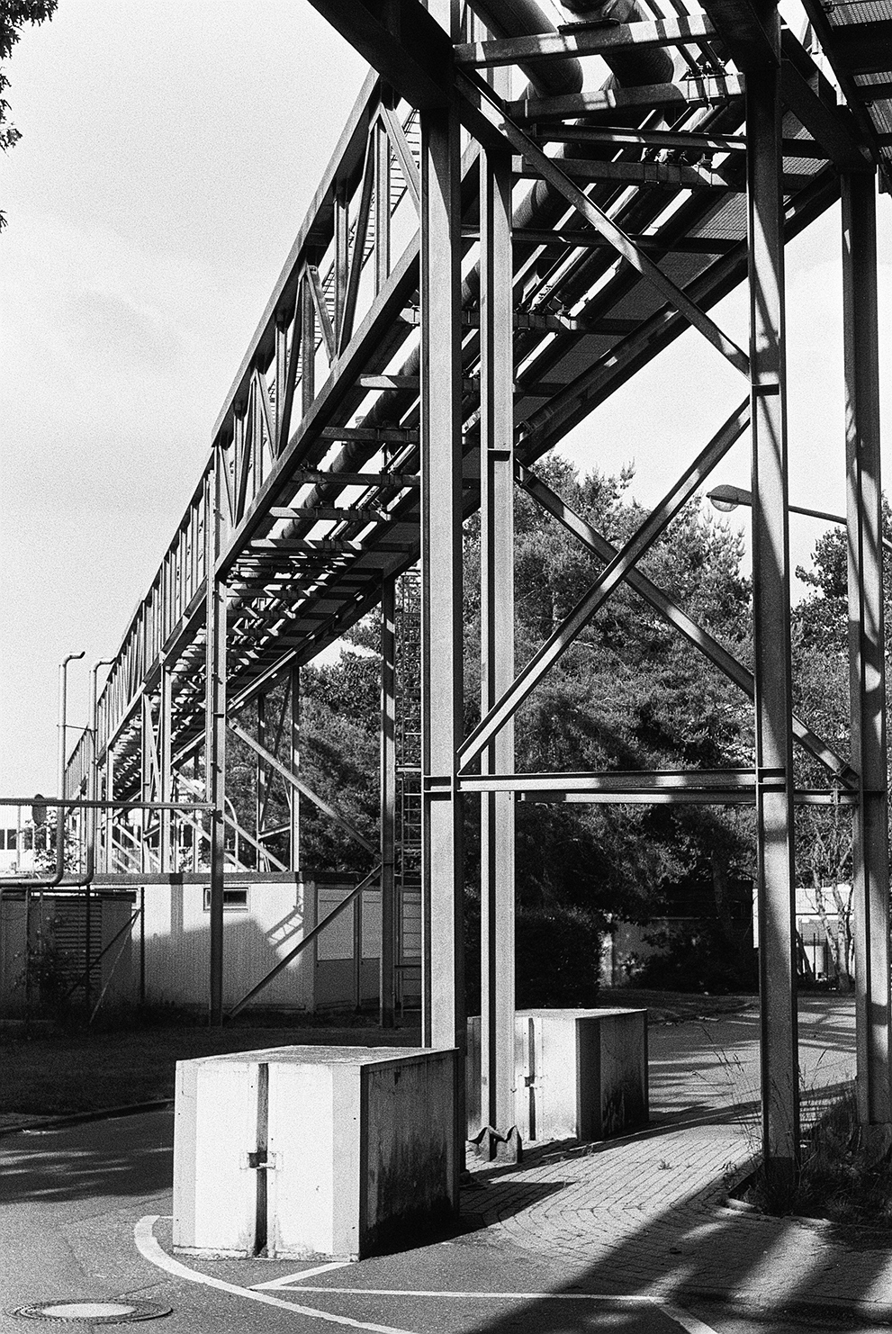 A modern viaduct with pipes. Shot Fomapan 400 action.